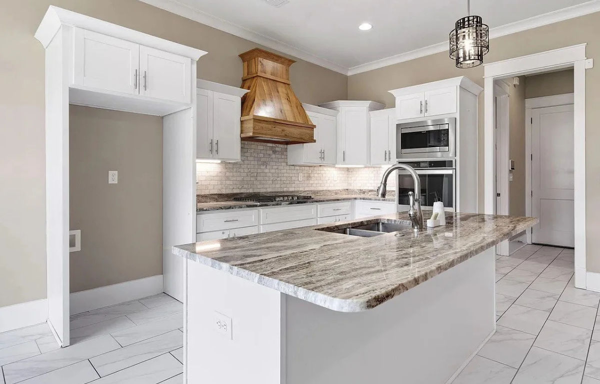 Cutom kitchen with quartz island.